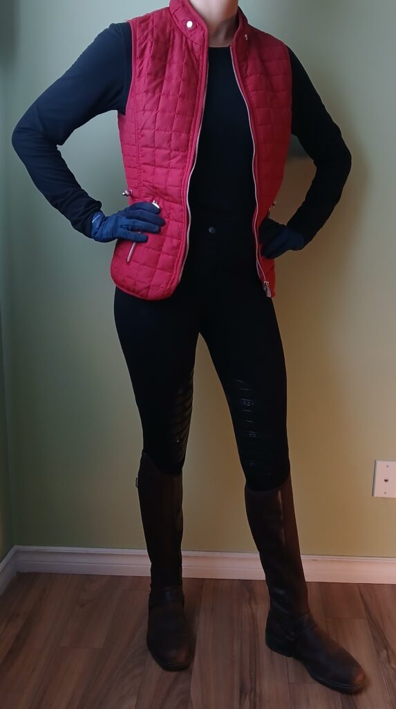 A red vest with black breeches